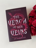 The Venom in Her Veins - J.E. Caroline